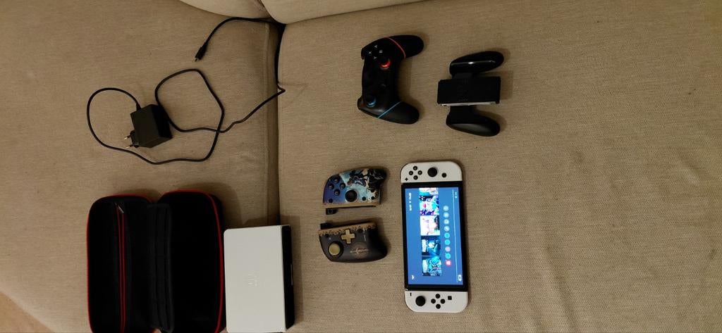 Switch oled wit 1 jr oud heel pakket!, Ophalen of Verzenden, Zo goed als nieuw, Met 1 controller, Switch OLED