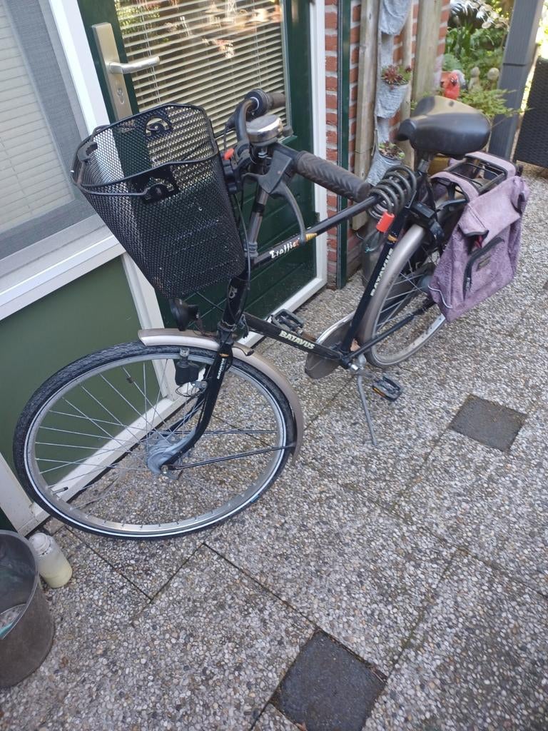 Batavus Traffic 4 herenfiets met mandn fietstassen, Fietsen en Brommers, Fietsen | Heren | Herenfietsen, Gebruikt, Versnellingen