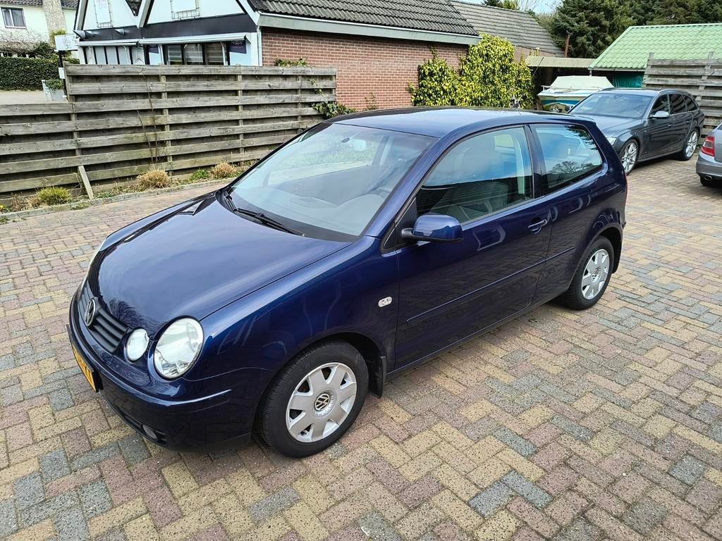 Volkswagen Polo 1.4 55KW 2002 Blauw, Auto's, Volkswagen, Voorwielaandrijving, Stof, 4 cilinders, Blauw