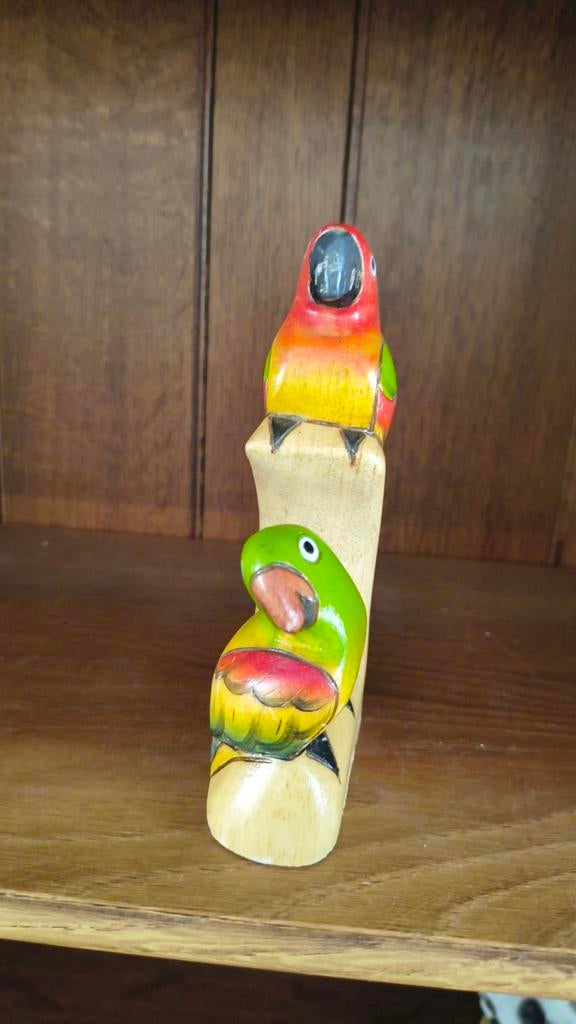 Handgemaakt houten beeldje van twee papegaaien, Ophalen