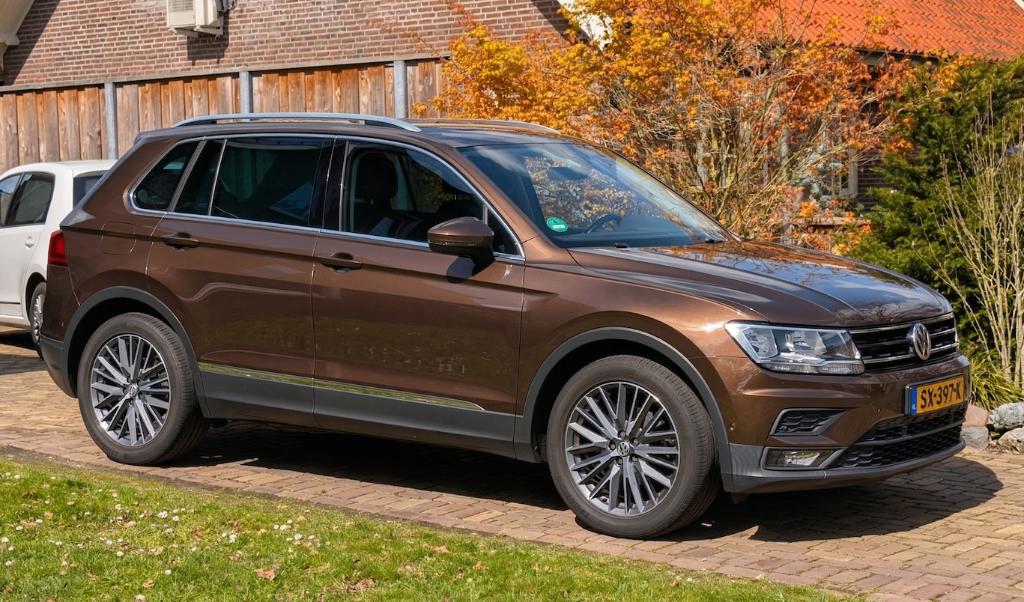 Volkswagen Tiguan 1.4 TSI 150PK, Auto's, Voorwielaandrijving, 1800 kg, Zwart, 4 cilinders