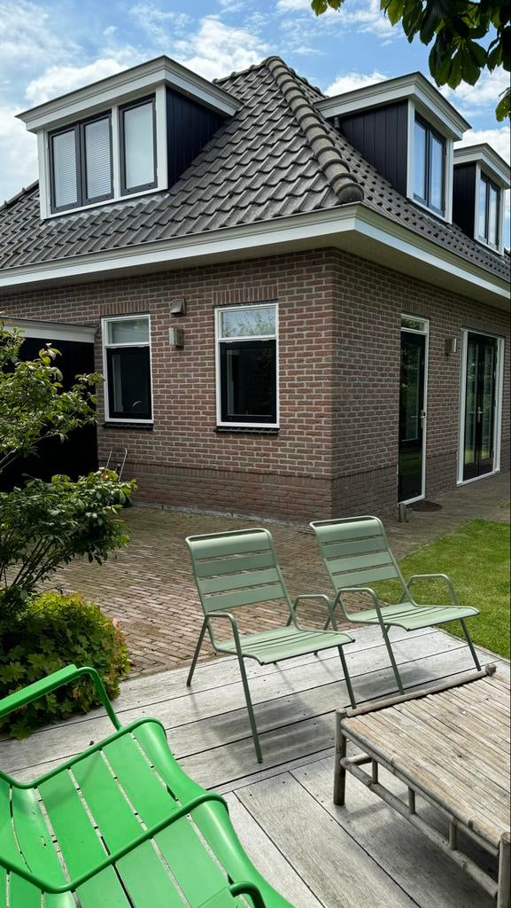 Twee Fermob loungestoelen kleur cactus, Tuin en Terras, Ophalen, Gebruikt, Metaal