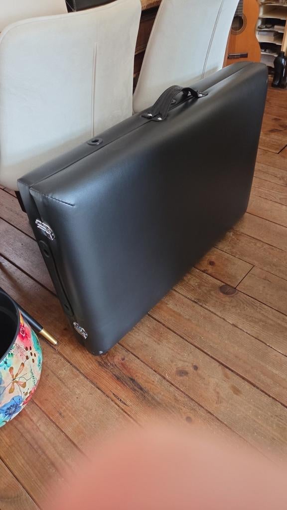 Mobiele massagetafel, Ophalen