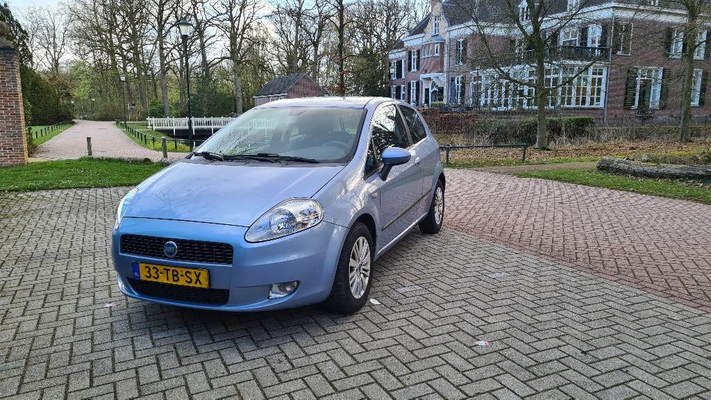 Fiat Punto 1.4 16V 3DR 2006 Blauw, Auto's, Voorwielaandrijving, Stof, 40 €/maand, Beige