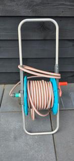 Te koop Gardena haspel tuinslang, Tuin en Terras, Tuinslangen, Ophalen, Zo goed als nieuw, Tuinslang