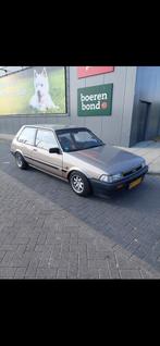 Toyota Corolla 1.3 DX HB AUT 1985 Beige, Auto's, Toyota, 74 pk, 4 cilinders, 400 kg, Corolla