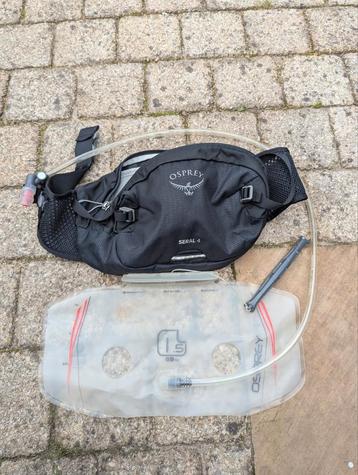 Osprey Seral 4 heuptas met 1,5L hydraulica drinkzak beschikbaar voor biedingen
