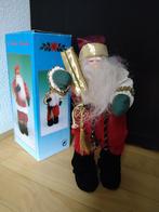 Kerstman met cadeau 26cm, Ophalen of Verzenden, Zo goed als nieuw