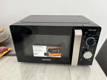 NIEUW Magnetron - Zwart - Nooit Gebruikt. Grillfunctie beschikbaar voor biedingen