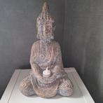 Buddha beeld, Ophalen