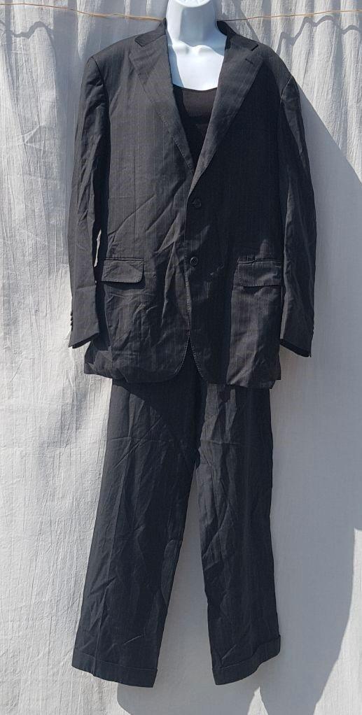 Prachtig heren kostuum. 100% wol Mt 52 Merk Canali, Kleding | Heren, Kostuums en Colberts, Zo goed als nieuw, Maat 52/54 (L), Grijs