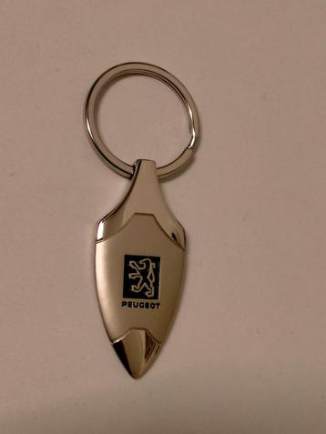 Peugeot auto vintage sleutelhanger logo auto's  beschikbaar voor biedingen