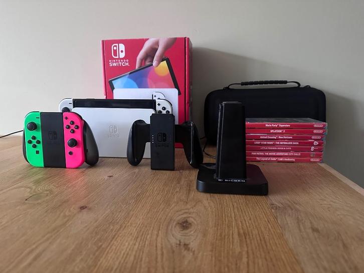 Nintendo Switch OLED - met 7 games en extra's, Spelcomputers en Games, Spelcomputers | Nintendo Switch, Gebruikt, Switch OLED