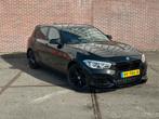 BMW 1-Serie 116i 109pk 2016 Zwart, Auto's, BMW, 65 €/maand, 1280 kg, Euro 6, Zwart