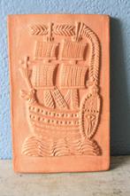 aardewerk plaquette Carel van Laere, Ophalen