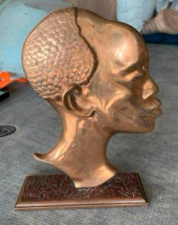 Bronzen bleed van Afrikaanse vrouw kunstenaar ? beschikbaar voor biedingen