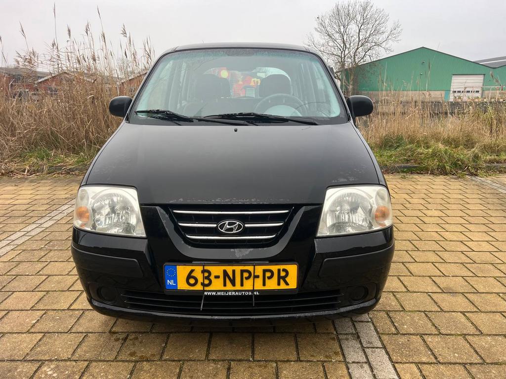 Hyundai Atos 1.1 2004 Zwart 158541 km, Auto's, Voorwielaandrijving, Euro 5, Stof, Metallic lak