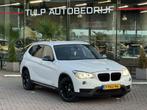 BMW X1 sDrive20i High Executive Automaat 2014 Leder stof Nav, Euro 6, 4 cilinders, Leder en Stof, Wit