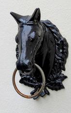 Gietijzeren Paardenhoofd, Ophalen