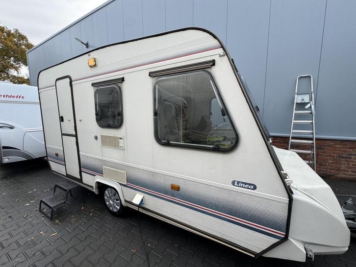 Adria Linea 400 TK met voortent + luifel, Caravans en Kamperen, Caravans, Bedrijf, tot en met 4, 500 - 750 kg, Treinzit, Adria