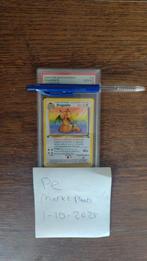Dragonite 1st edition Fossil Dutch PSA 10 gem mint #19, Ophalen of Verzenden, Zo goed als nieuw, Losse kaart, Foil
