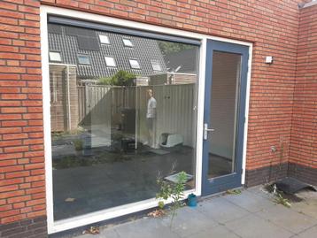 Nette achtergevelpui deurkozijn  beschikbaar voor biedingen