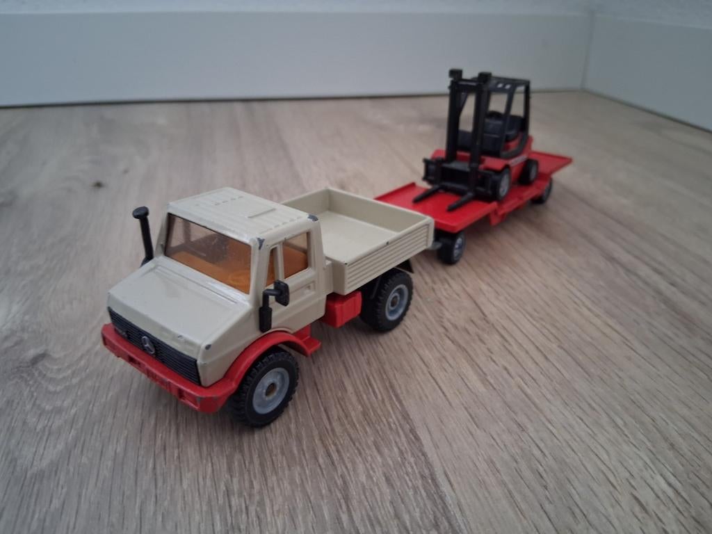 Siku unimog met dieplader en heftruck, Hobby en Vrije tijd, Ophalen of Verzenden, Bus of Vrachtwagen, SIKU
