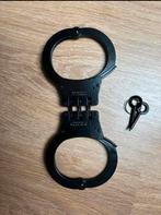 Handboeien zwart | geschakeld, Ophalen of Verzenden, Landmacht, Nederland, Overige typen