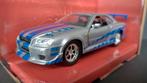 Brian's Nissan Skyline GT-R Bnr34 1:32 Jada Fast Furious Pol, Hobby en Vrije tijd, Modelauto's | 1:32, Verzenden, Nieuw, Auto