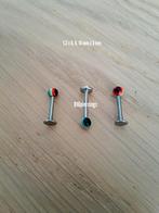 Nieuwe labret piercing. Rasta. 1,2 Mm., Sieraden, Tassen en Uiterlijk, Piercings, Ophalen of Verzenden, Zo goed als nieuw, Staal