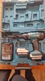 Makita DF347 accu boormachine met koffer en 2 accu's, Ophalen of Verzenden, Gebruikt, Boor- en Schroefmachine, Variabele snelheid