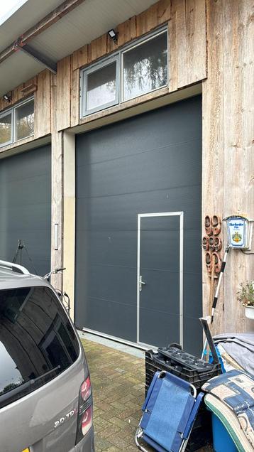 Overheaddeur incl doorloopdeur beschikbaar voor biedingen