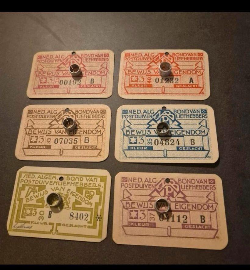 Oude duivenringen met eigendomsbewijsen erbij, Postduif