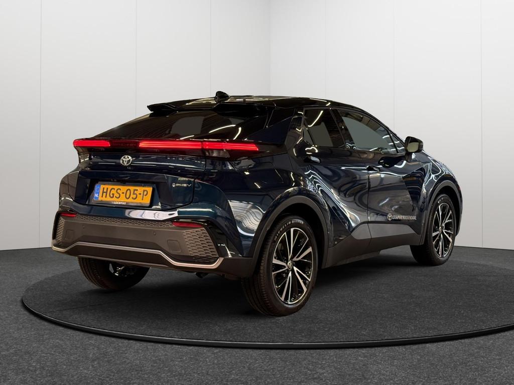 Toyota C-HR Plug-in Hybrid 220 Executive | Navigatie | Parke, Auto's, Toyota, 12 maanden, 4 cilinders, Blauw, Leder en Stof