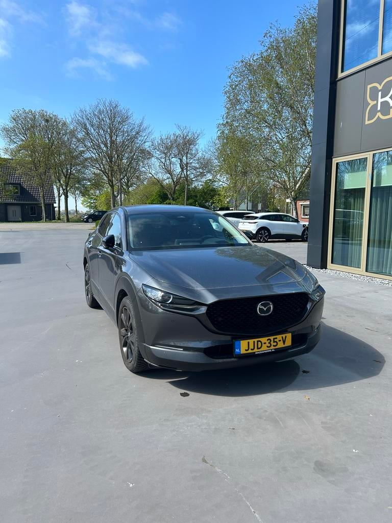 Mazda CX-30 E-skyactiv X 186pk M Hybrid Aut 2025 Grijs, Auto's, Mazda, 1998 cc, 1440 kg, Origineel Nederlands, SUV of Terreinwagen