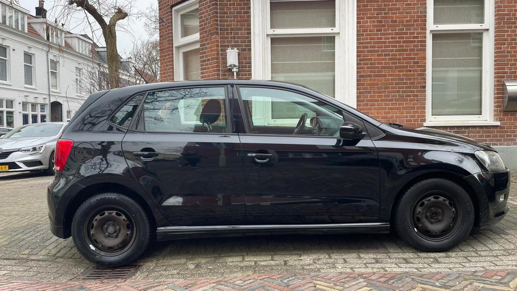 Volkswagen Polo 1.2 TDI 55KW BM 2012 Zwart, Auto's, Voorwielaandrijving, Euro 5, Stof, 74 pk