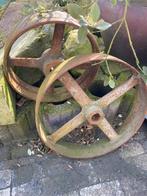 Gietijzeren wielen aandrijf voor smederij, Ophalen