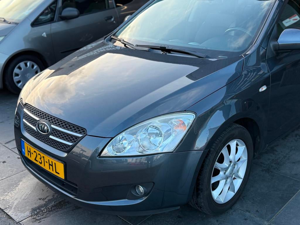 Kia Cee'd Sporty Wagon 1.6 X-clusive|AUTOMAAT|Airco|PDC|APK, Stof, Gebruikt, 4 cilinders, Met garantie (alle)