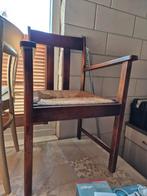 Houten stoel met biezen zitting, Ophalen