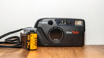 Canon Prima Twin. 35mm camera met dubbele lens beschikbaar voor biedingen