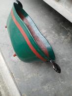 Gietijzeren kolenbak, Ophalen