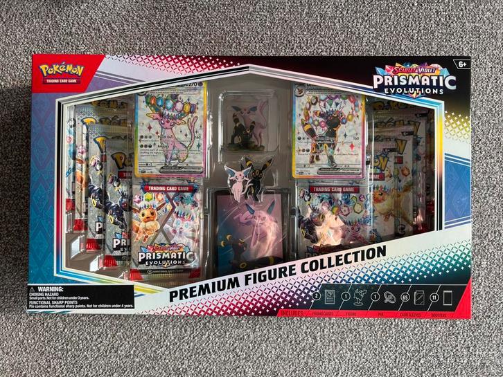 Prismatic Evolutions - Premium Figure Collection, Hobby en Vrije tijd, Verzamelkaartspellen | Pokémon, Nieuw, Boosterbox, Ophalen of Verzenden