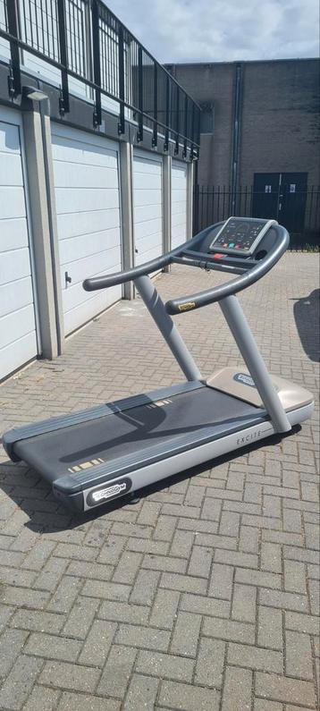 Technogym jog loopband hometrainer led scherm beschikbaar voor biedingen