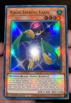 Yu-Gi-Oh! Toon Harpie Lady BLCR-EN066 1st Ed Mint, Foil, Ophalen of Verzenden, Losse kaart, Zo goed als nieuw