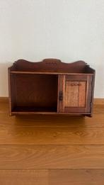 Antiek houteneiken hang kastje, Ophalen