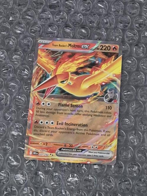 Team Rocket's Moltres ex 031/182 Destined Rivals Scarlet & V, Hobby en Vrije tijd, Verzamelkaartspellen | Pokémon, Zo goed als nieuw