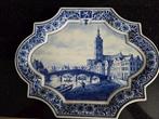 Delftsblauw wandbord, Ophalen