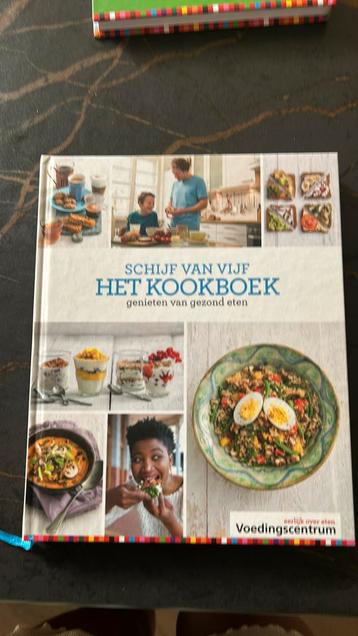 Schijf van vijf het kookboek beschikbaar voor biedingen