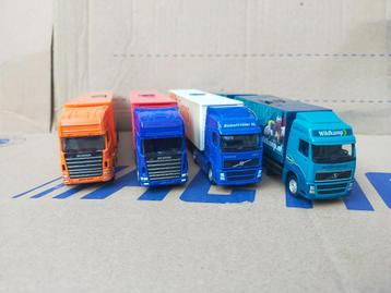 Vier vrachtwagens. 2 x Scania en 2 x volvo beschikbaar voor biedingen