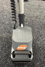 Schrobmachine, Ophalen